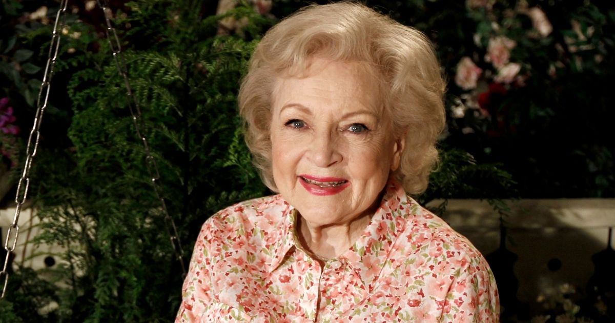 Actress Betty White poses for a picture on the set of her show "Hot in Cleveland" on June 9, 2021.