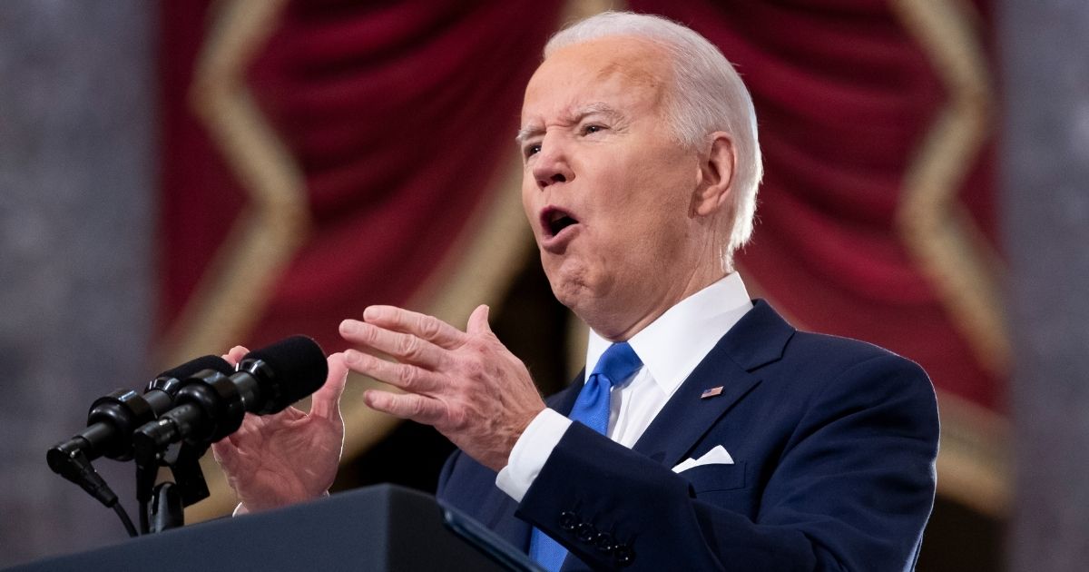 President Joe Biden gestures during his speech marking the one-year anniversary of the Jan. 6 Capitol incursion in Statuary Hall of the Capitol in Washington on Thursday.