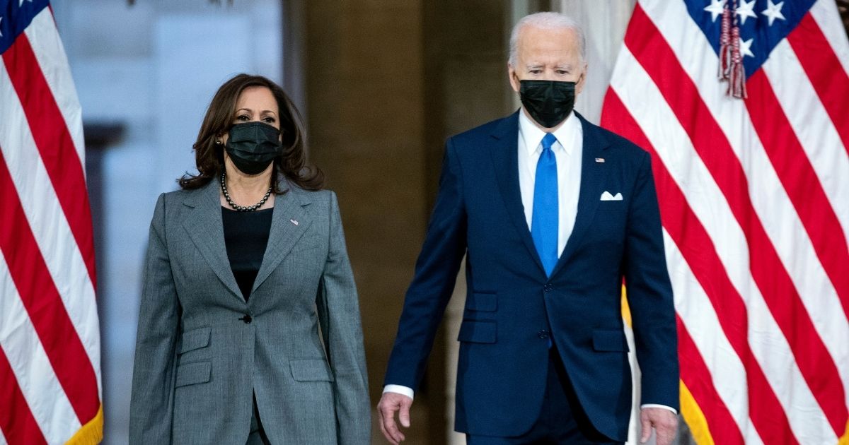 President Joe Biden, right, and Vice President Kamala Harris, left, walk into the U.S. Capitol in Washington, D.C., on Jan. 6 to commemorate the one year anniversary of the Capitol incursion.