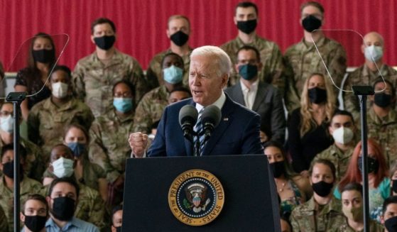 President Joe Biden addresses U.S. Air Force personnel at RAF Mildenhall in Suffolk, England, on June 9.