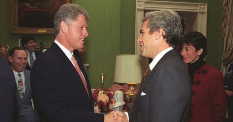 Then-President Bill Clinton, left, shakes hands with financier Jeffrey Epstein, as Epstein's associate Ghislaine Maxwell stands in the background.