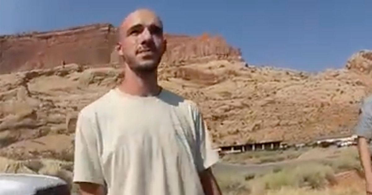This Aug. 12, 2021, photo from video provided by the Moab Police Department shows Brian Laundrie talking to a police officer after police pulled over the van he was traveling in with his girlfriend, Gabby Petito, near the entrance to Arches National Park in Utah.
