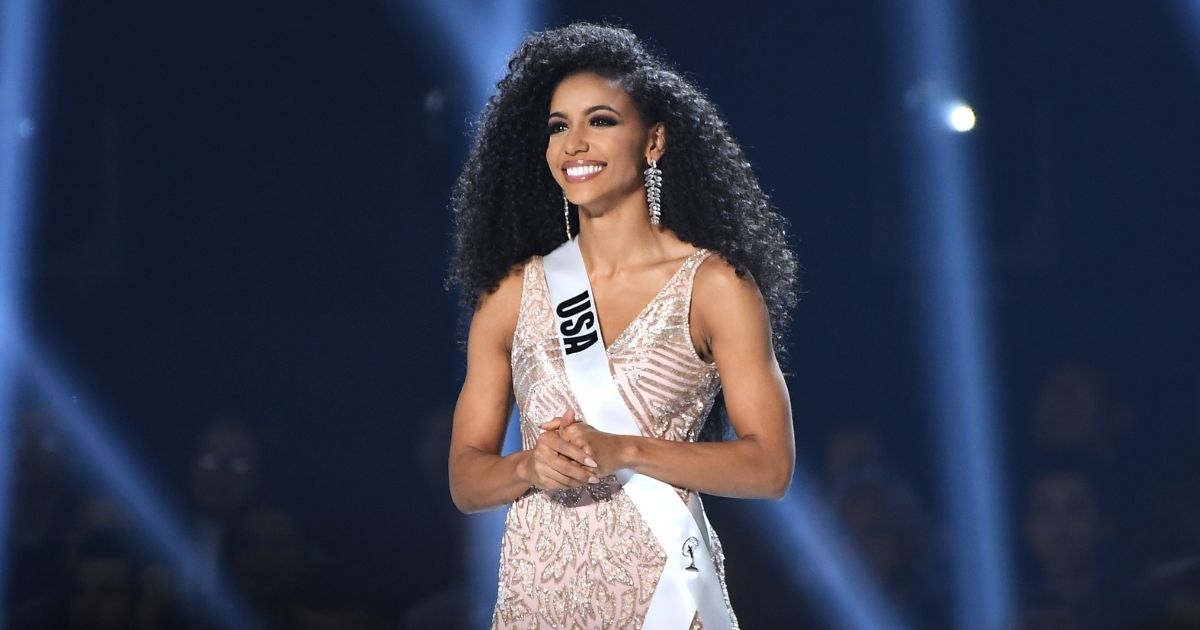 Miss USA Cheslie Kryst appears onstage at the 2019 Miss Universe Pageant at Tyler Perry Studios on Dec. 8, 2019, in Atlanta.
