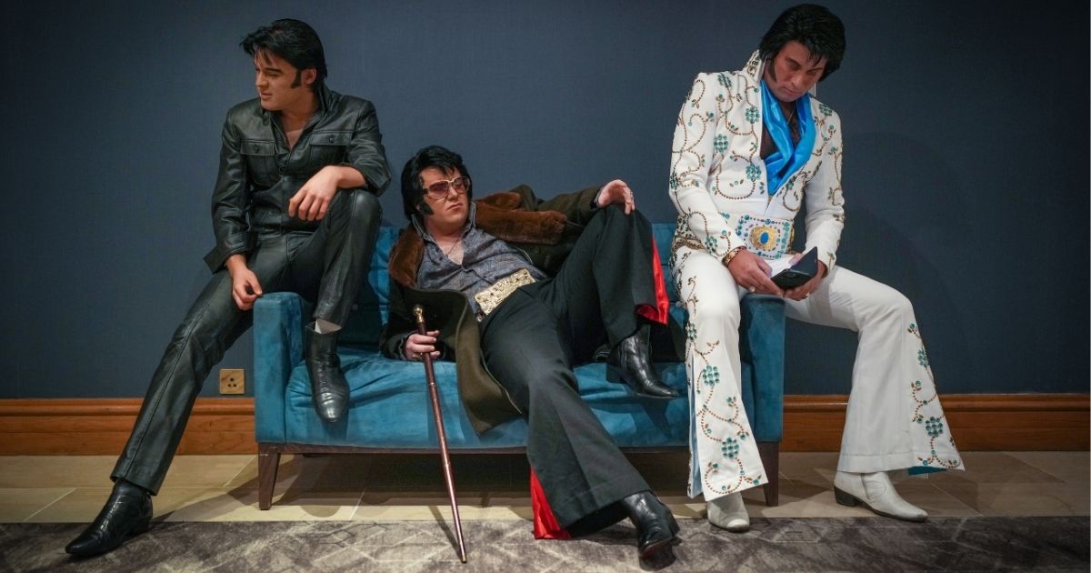 Elvis tribute artists, from left, Arron Walker, Rob Willis and Phoenix Dean pose for the media as they wait to perform during the European Elvis Championships on Friday, Jan. 7, at the Hilton Hotel in Birmingham, England. The competition returned for 2022 after last year's event was cancelled due to Covid-19 restrictions. Elvis impersonators took place in three days of competition to be crowned the king of Europe's Elvis tribute artists. 