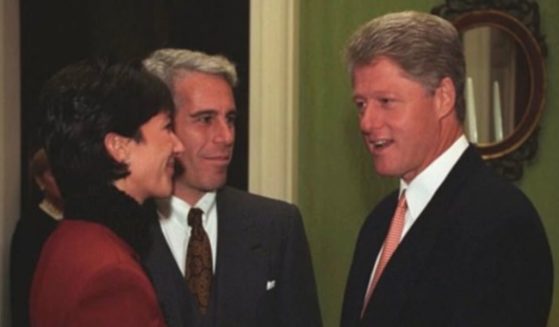 Then-President Bill Clinton, right, speaks with financier Jeffrey Epstein and his associate Ghislaine Maxwell during a visit the pair made to the White House.