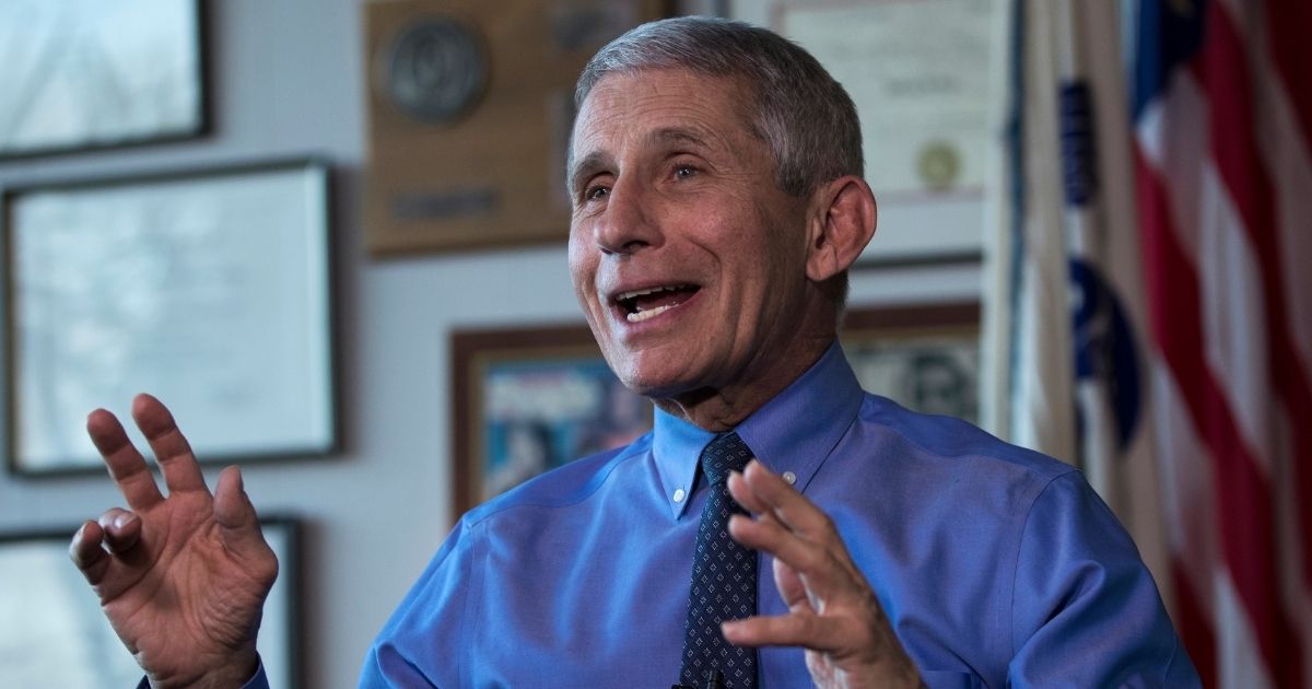Dr. Anthony Fauci, director of the National Institute for Allergy and Infectious Diseases, is seen in his office at the National Institutes of Health in this file photo from December 2017. Viewers of a documentary about Fauci have noted an odd thing about the images with which Fauci surrounds himself.