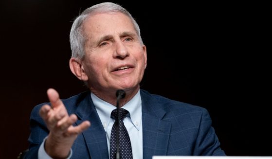 Dr. Anthony Fauci testifies before a Senate committee hearing Tuesday on Capitol Hill in Washington. Fauci was caught on a hot mic disparaging a senator and taking the Lord's name in vain.
