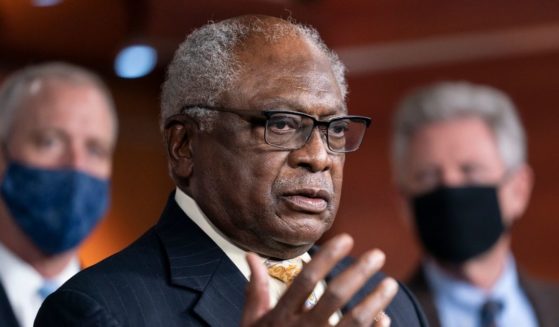 Democratic Rep. James Clyburn of South Carolina speaks to reporters in the Capitol in Washington, D.C., on Nov. 19, 2021, after the House approved the Democrats' social and environment bill.