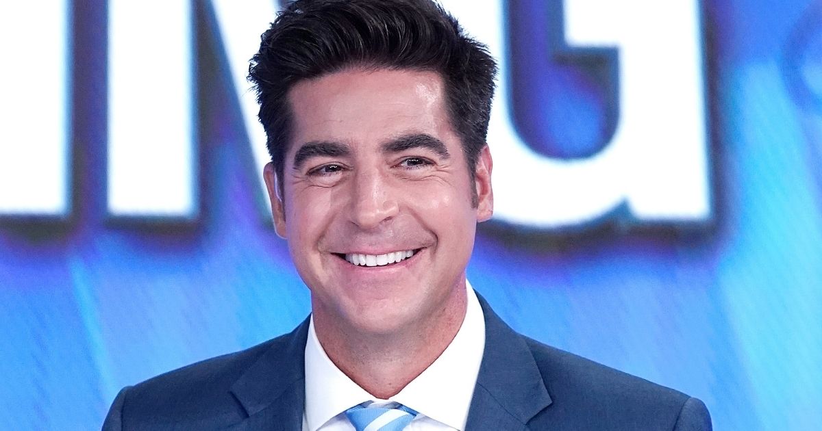 Jesse Watters, co-host of "The Five," smiles during a segment of the show at Fox News Channel Studios in New York City on Sept. 12, 2019.