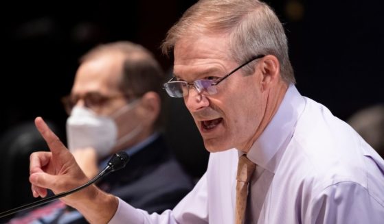 Republican Rep. Jim Jordan of Ohio speaks beside House Judiciary Committee Chairman Jerry Nadler of New York during a Judiciary Committee hearing at the Capitol in Washington on Oct. 21.