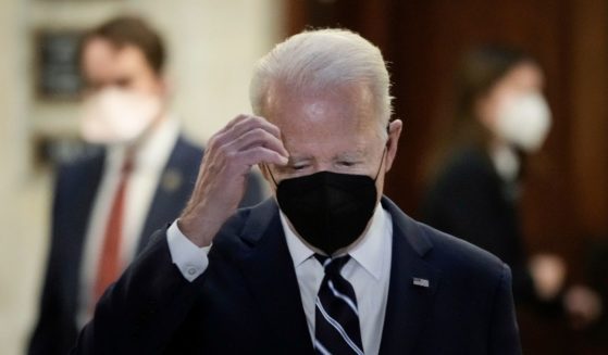 President Joe Biden leaves a meeting in the Russell Senate Office Building on Capitol Hill on Thursday in Washington, D.C.