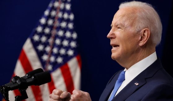 President Joe Biden gestures during a speech at the Eisenhower Executive Office Building's South Court Auditorium in Washington on Friday.