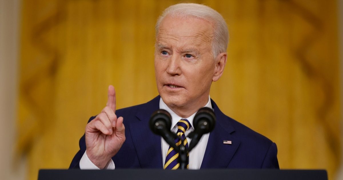 President Joe Biden talks to reporters during a news conference in the East Room of the White House in Washington on Wednesday.