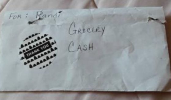 After finding this envelope full of cash in a park in Westfield, New Jersey, on Friday, Kim DeRosa took to Facebook to find the owner and return the money.
