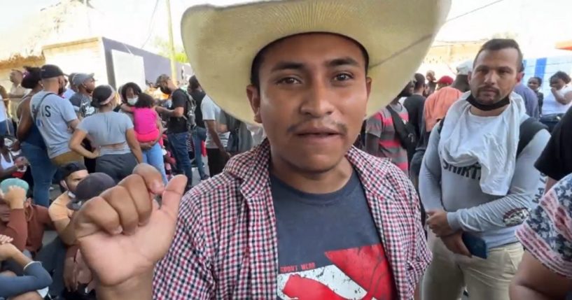 A Guatemalan migrant threatens to violently force his way into the United States.