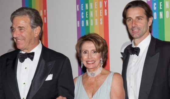 Then-House Minority Leader Nancy Pelosi, center, arrives with her husband Paul Pelosi, left, and son Paul Pelosi, Jr. at the 35th Kennedy Center Honors, at the Kennedy Center in Washington, D.C., on Dec. 2, 2012.