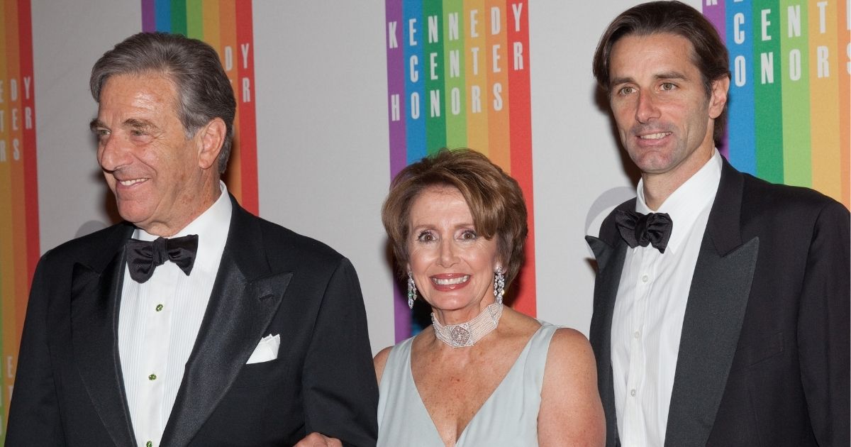 Then-House Minority Leader Nancy Pelosi, center, arrives with her husband Paul Pelosi, left, and son Paul Pelosi, Jr. at the 35th Kennedy Center Honors, at the Kennedy Center in Washington, D.C., on Dec. 2, 2012.