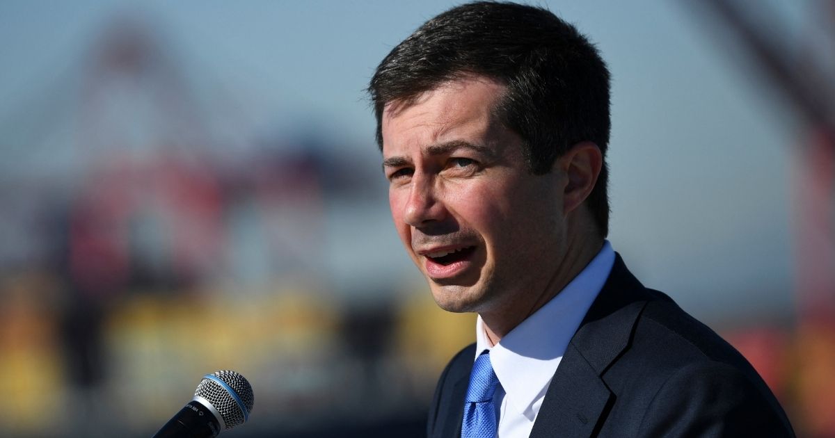 US Department of Transportation Secretary Pete Buttigieg speaks after a tour of the Ports of Los Angeles and Long Beach during a press conference Tuesday, Jan. 11, in Long Beach, California.