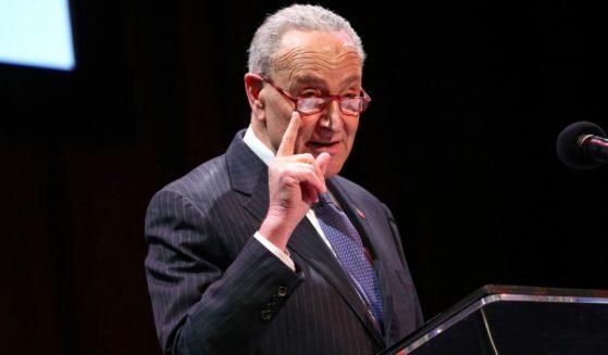 Senate Majority Leader Chuck Schumer, seen speaking at an event earlier this month, may have an option for federalizing elections that could bypass the filibuster challenge. Some Democrats are considering forcing Republicans to hold the Senate floor with arguments in hopes that they will grow tired and allow Schumer to call for a simple-majority vote.
