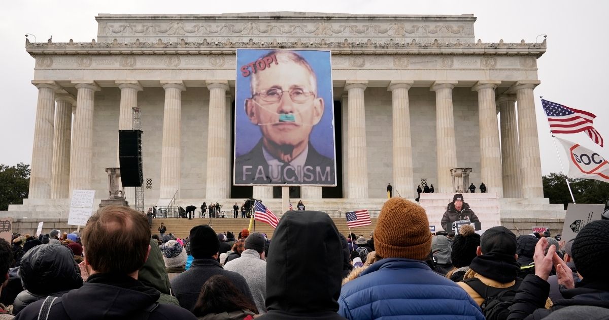 Protesters gather for rally protesting vaccine mandates in front of the Lincoln Memorial in Washington on Sunday. Fox news estimated attendance at 30,000 to 35,000.