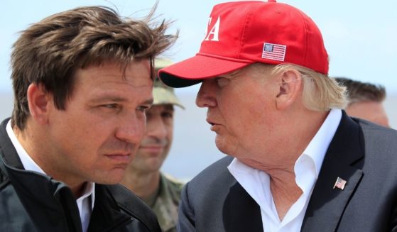 While Florida Gov. Ron DeSantis, left, has been called a rising star in the Republican party, a recent poll shows that former President Donald Trump, right, has the highest chance of winning the party's presidential nomination in the 2024 election.