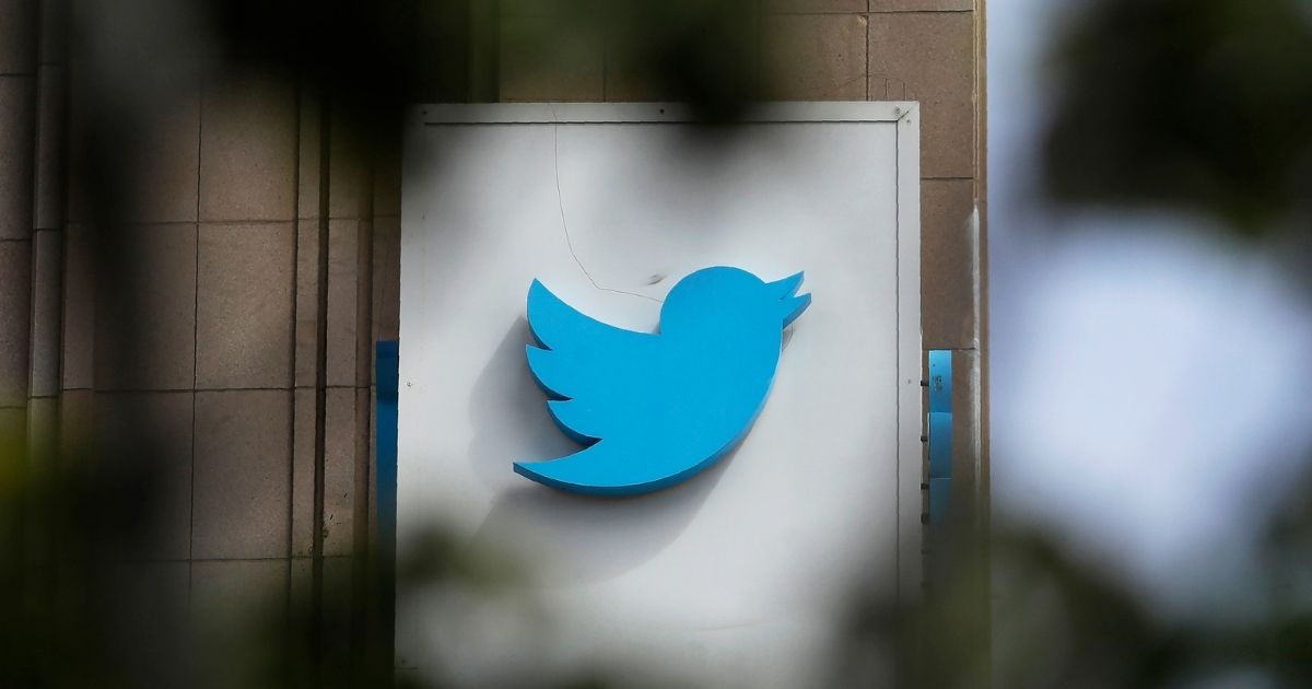 The Twitter logo is shown on a door outside the Twitter offices in San Francisco, California, on July 9, 2019.