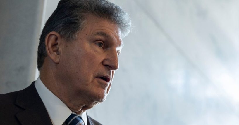 West Virginia Democratic Sen. Joe Manchin speaks to reporters Tuesday outside of his office on Capitol Hill.