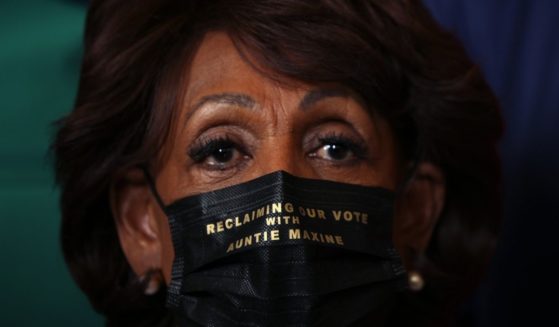 Democratic Rep. Maxine Waters of California attends a news conference on voting rights with members of the Congressional Black Caucus at the U.S. Capitol on July 21, 2021.