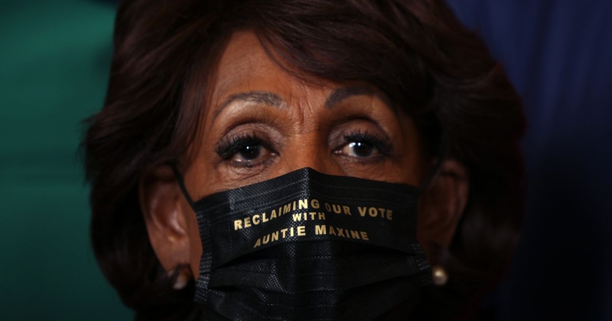 Democratic Rep. Maxine Waters of California attends a news conference on voting rights with members of the Congressional Black Caucus at the U.S. Capitol on July 21, 2021.