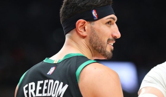 Boston Celtics center Enes Kanter Freedom looks on during a game against the Portland Trail Blazers in Portland, Oregon, on Dec. 4, 2021. Kanter Freedom is a political activist from Turkey who has been an outspoken critic of China.