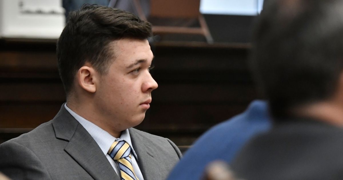 Then-Wisconsin homicide defendant Kyle Rittenhouse listens as the judge speaks during Rittenhouse's trial on homicide charges in November.