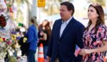 Florida Gov. Ron DeSantis and his wife, Casey, shown visiting a memorial to those missing outside the 12-story condo building that partially collapsed this past summer, are optimistic about Casey's fight against breast cancer.