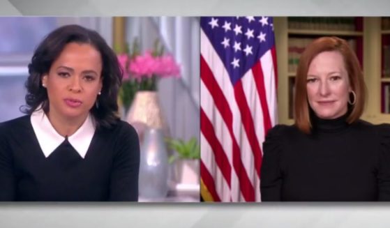 When speaking Friday on ABC's 'The View' about the Democrats' inability to gut the Senate filibuster rule, White House Press Secretary Jen Psaki, right, encouraged those 'frustrated' by the failure to 'have a margarita.'