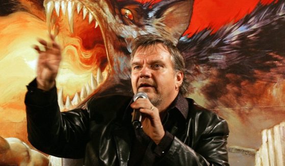 Rock star Meat Loaf gestures as he speaks during a press conference in Hong Kong on Sept. 4, 2006. Meat Loaf, whose real name was Marvin Lee Aday, died Thursday, reportedly of COVID-19.