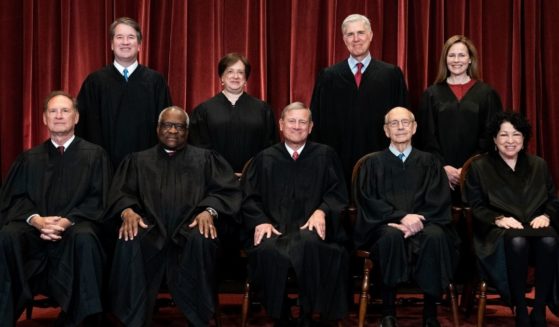 Members of the Supreme Court are pictured in an official portrait from April 2021: Seated from left: Associate Justice Samuel Alito, Associate Justice Clarence Thomas, Chief Justice John Roberts, Associate Justice Stephen Breyer and Associate Justice Sonia Sotomayor. Standing from left: Associate Justice Brett Kavanaugh, Associate Justice Elena Kagan, Associate Justice Neil Gorsuch and Associate Justice Amy Coney Barrett.