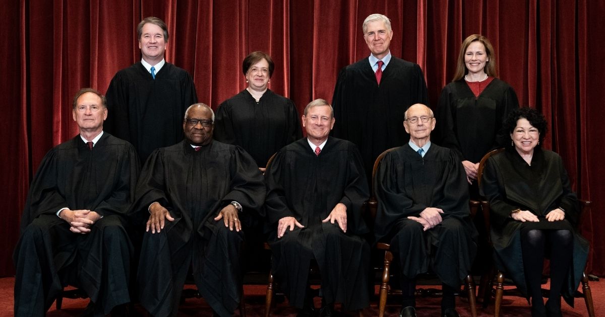Members of the Supreme Court are pictured in an official portrait from April 2021: Seated from left: Associate Justice Samuel Alito, Associate Justice Clarence Thomas, Chief Justice John Roberts, Associate Justice Stephen Breyer and Associate Justice Sonia Sotomayor. Standing from left: Associate Justice Brett Kavanaugh, Associate Justice Elena Kagan, Associate Justice Neil Gorsuch and Associate Justice Amy Coney Barrett.
