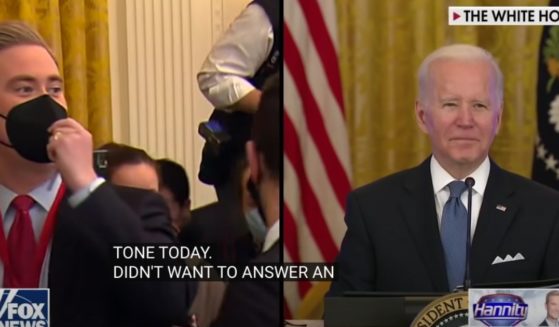 Fox News correspondent Peter Doocy asks President Joe Biden a question about inflation Monday as Biden was meeting with his Competition Council and members of his Cabinet. Biden cursed about Doocy after the question was asked, a hot mic catching the president's words.