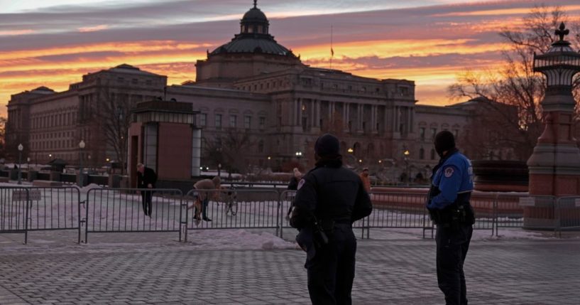 Capitol Police officers are pictured outside the Capitol on the one-year anniversary of the Jan. 6 Capitol incursion.