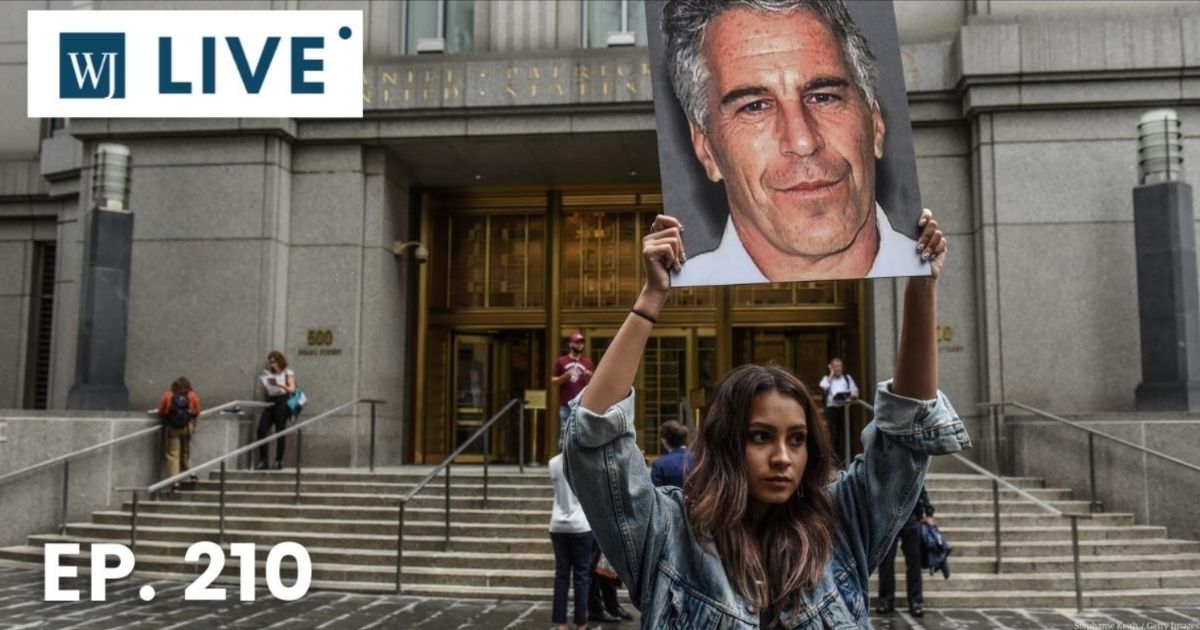 A protest group called "Hot Mess" hold up signs of Jeffrey Epstein in front of the federal courthouse on July 8, 2019, in New York City.