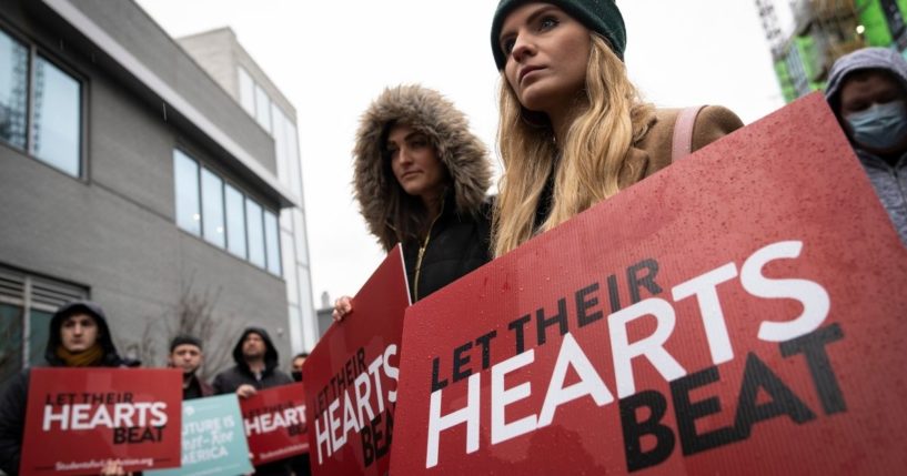 Pro-life activists protest outside of a Planned Parenthood clinic on Thursday in Washington, D.C.