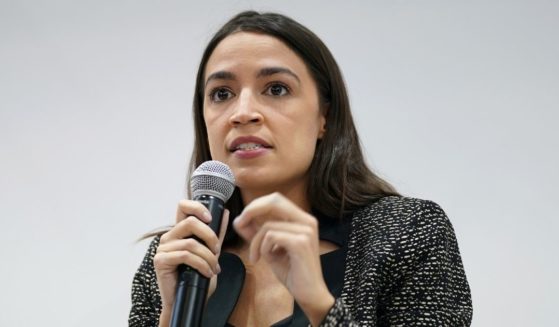 Democratic Rep. Alexandria Ocasio-Cortez of New York speaks during an event at the US Climate Action Centre during COP26 on Nov. 9, 2021, in Glasgow, Scotland.