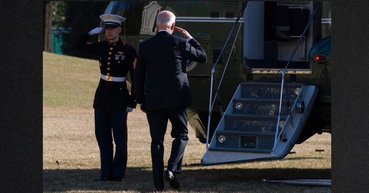 President Joe Biden boards Marine One in Washington Friday to travel to Camp David..