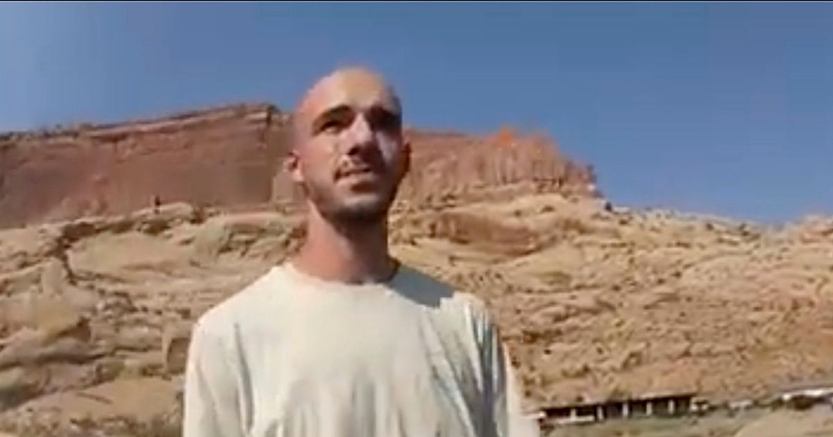 Brian Laundrie talks to police officers in Moab, Utah, after being pulled over with his girlfriend Gabby Petito near Arches National Park on Aug. 12, 2021.