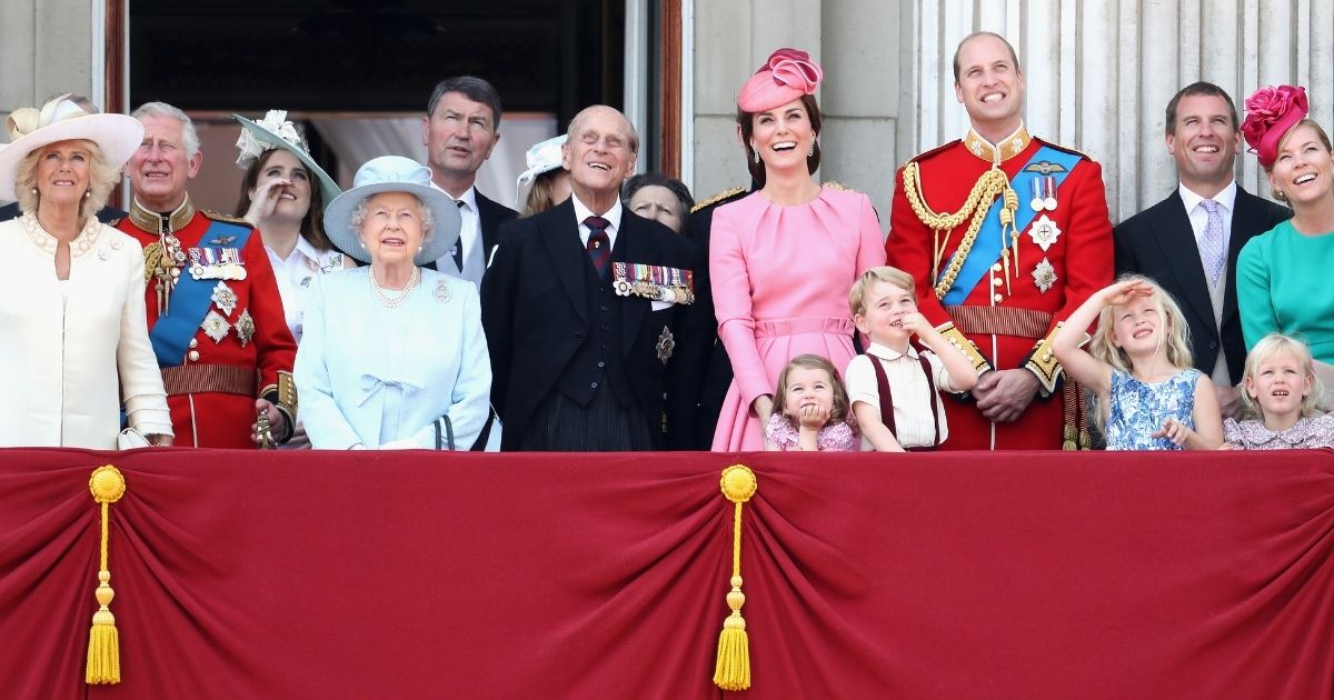 Prince Philip, the duke of Edinburgh, center, and other members of the British royal family look out from the balcony of Buckingham Palace in London during the Trooping the Colour parade on June 17, 2017.