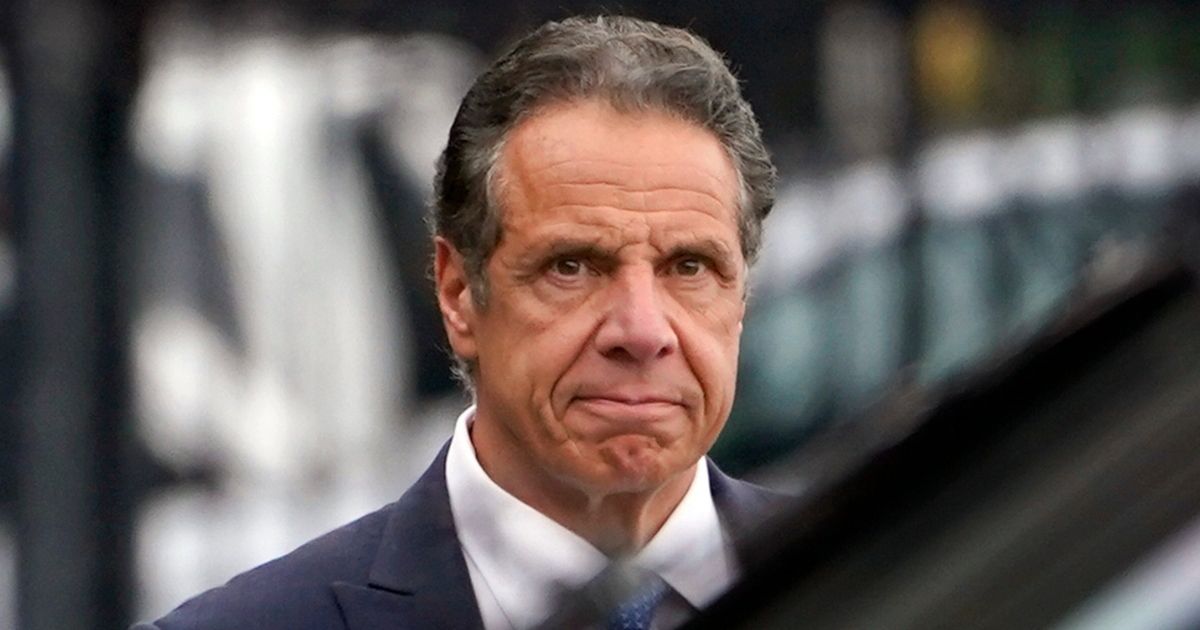 Former New York Gov. Andrew Cuomo makes his way to a helicopter In New York City after announcing his resignation on Aug. 10, 2021.