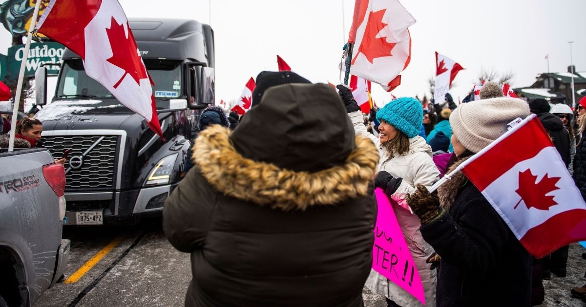 Protesters show their support for the Freedom Convoy of truck drivers
