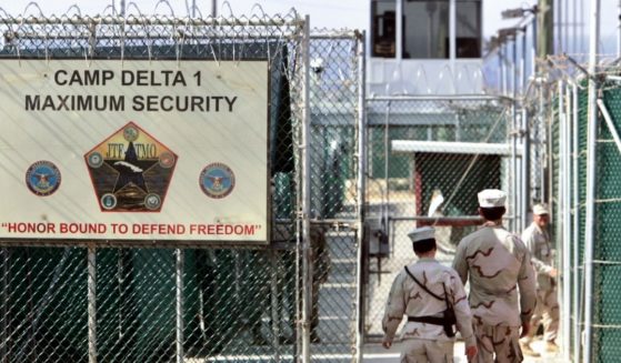 On June 27, 2006, U.S. military guards enter Camp Delta, the military-run prison, located on the Guantanamo Bay U.S. Naval Base in Cuba.