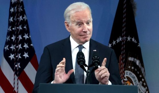 President Joe Biden gestures as he speaks at the National Association of Counties Legislative Conference at the Washington Hilton in Washington on Tuesday.