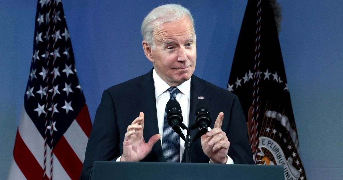 President Joe Biden gestures as he speaks at the National Association of Counties Legislative Conference at the Washington Hilton in Washington on Tuesday.