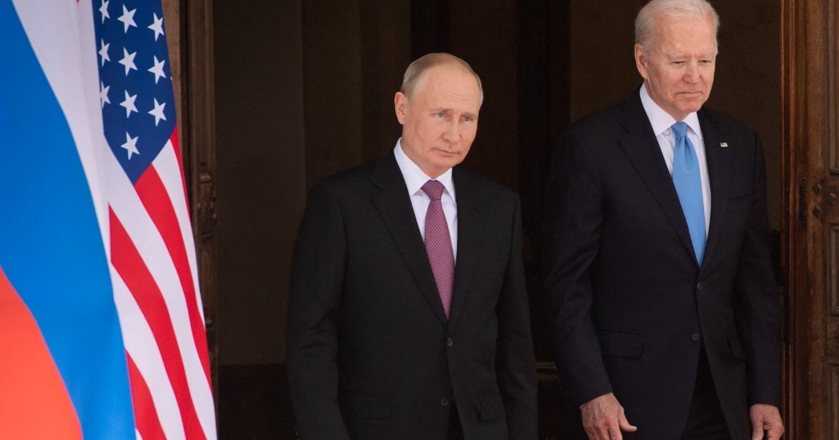 President Joe Biden, right, and Russian President Vladimir Putin arrive for a summit in Geneva on June 16, 2021.